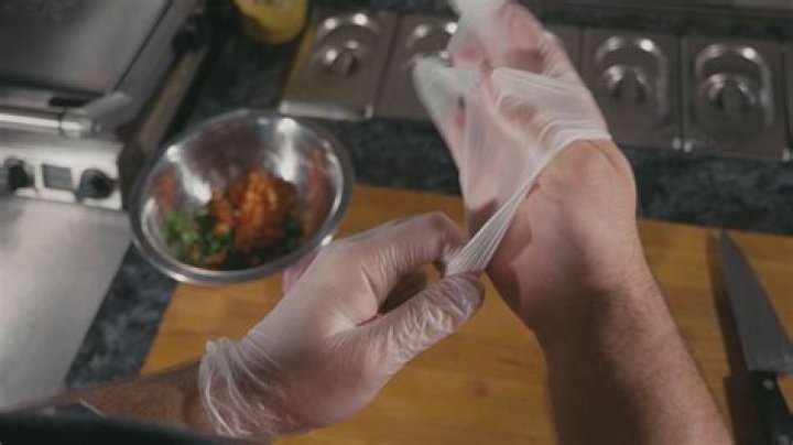 Are gloves required when handling food?