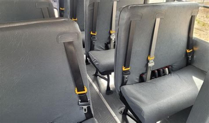Are school buses safer without seatbelts?