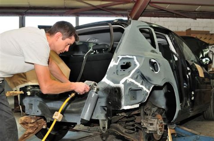 Can a body shop repair rust?