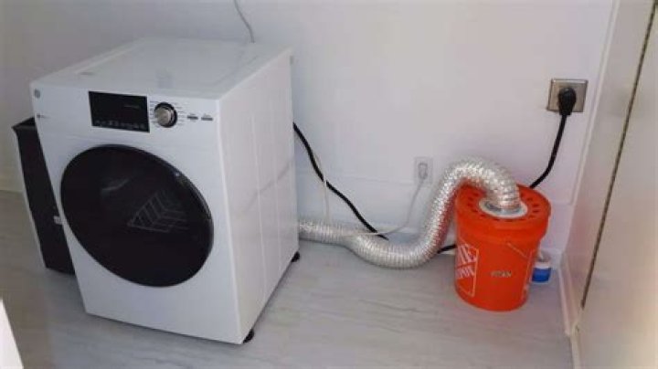 Can dryer vent touch wood?