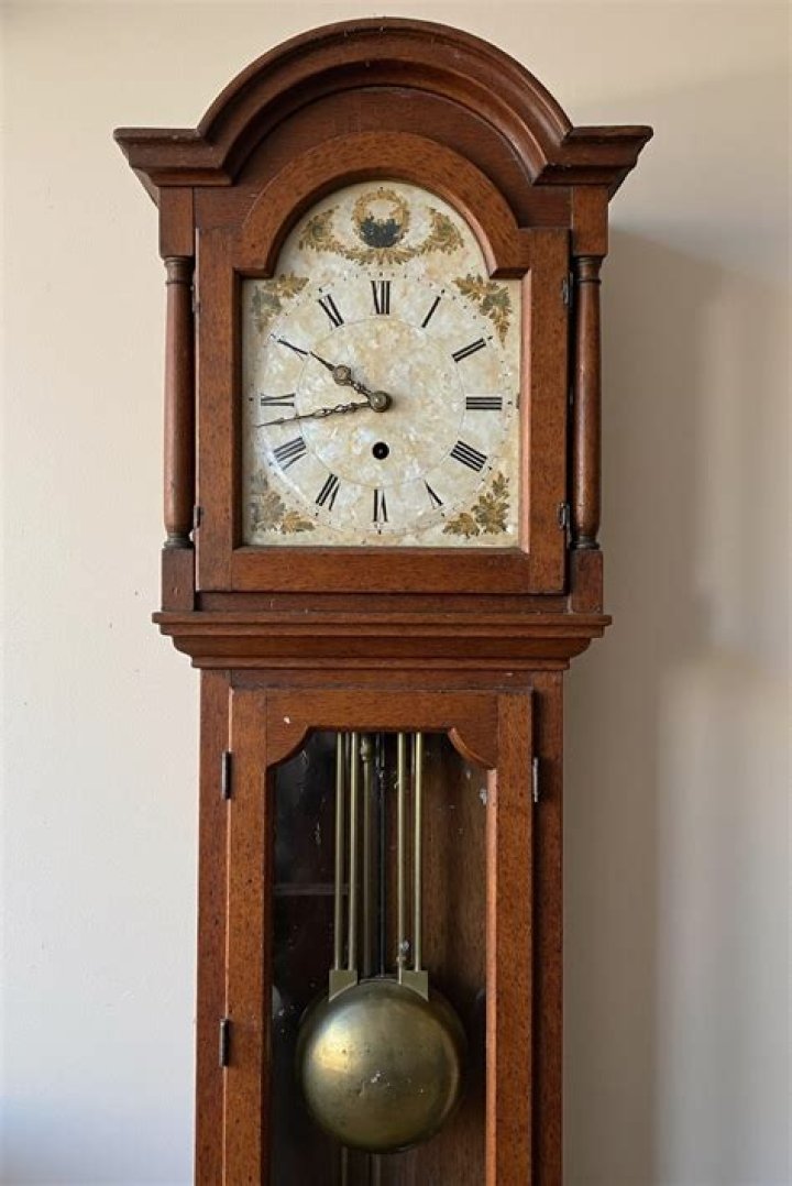 Can I transport a grandfather clock on its back?