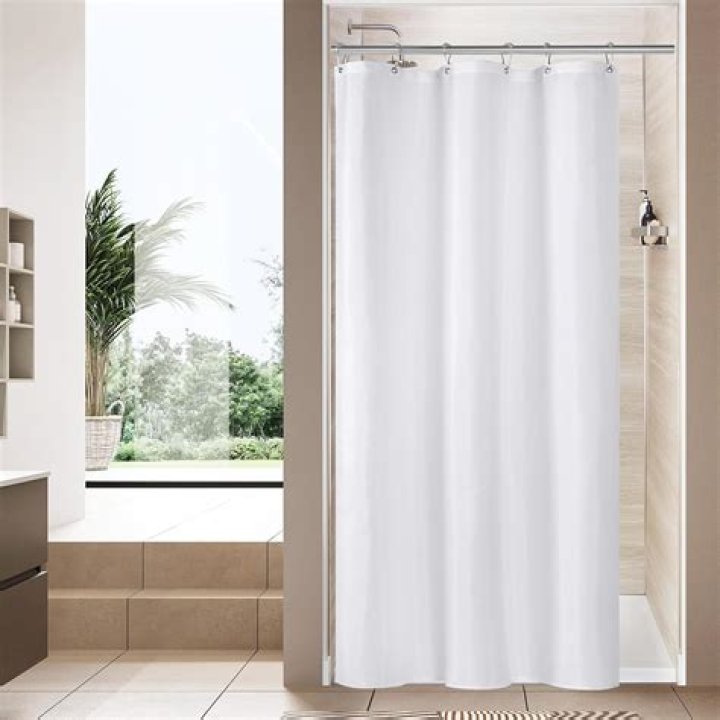 Can I use a shower curtain in a shower stall?