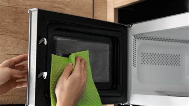 Can you clean the inside of a microwave with Lysol wipes?