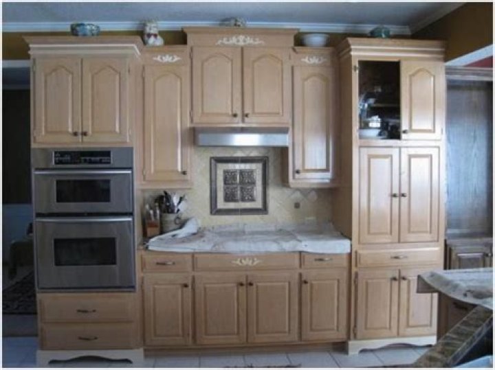 Can you refinish pickled oak cabinets?