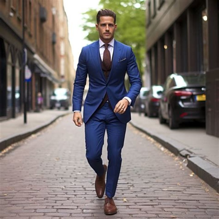 Does Brown shoes go with a GREY suit?