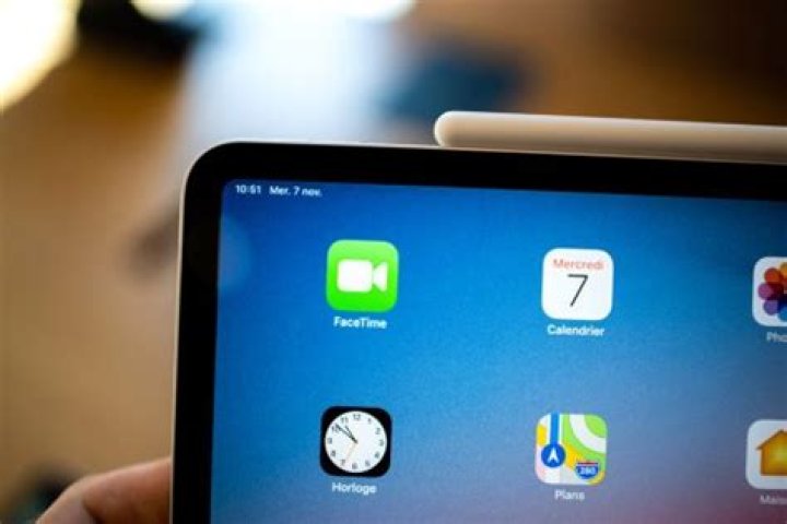 Does using iPad while charging affect battery life?