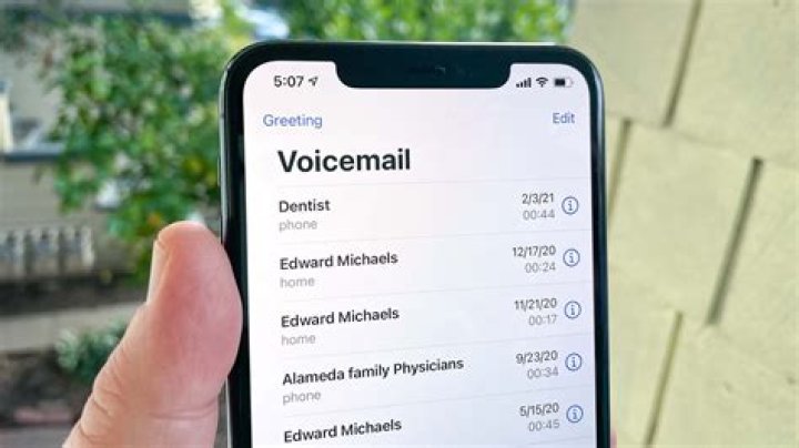 How do I change my voicemail language back to English on Iphone?