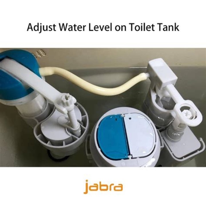 How do I raise the water level in my Toto toilet bowl?