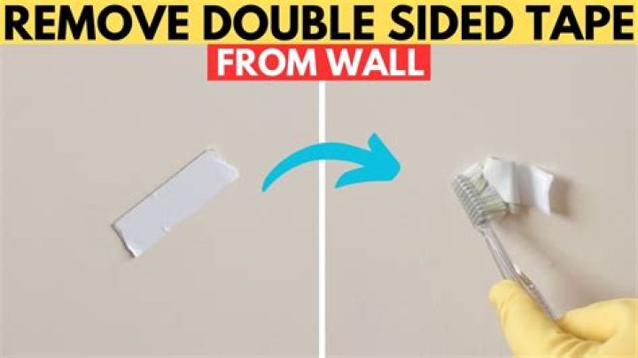 How do I remove wall base adhesive?