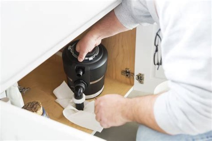 How do I reset my Kitchenaid garbage disposal?