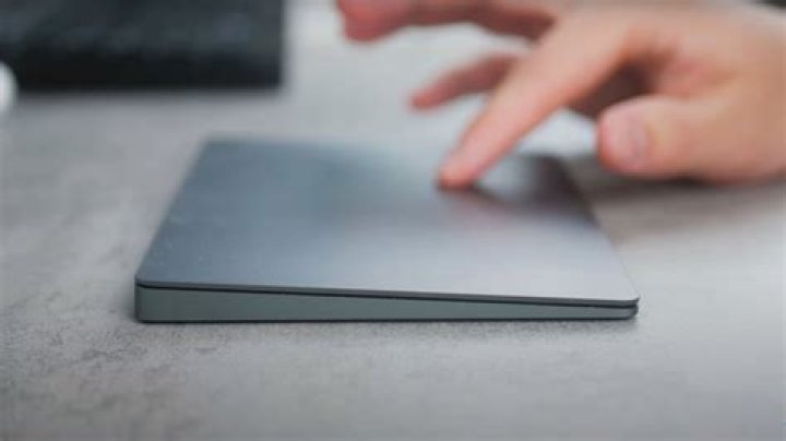How do I scroll with my MacBook Pro trackpad?