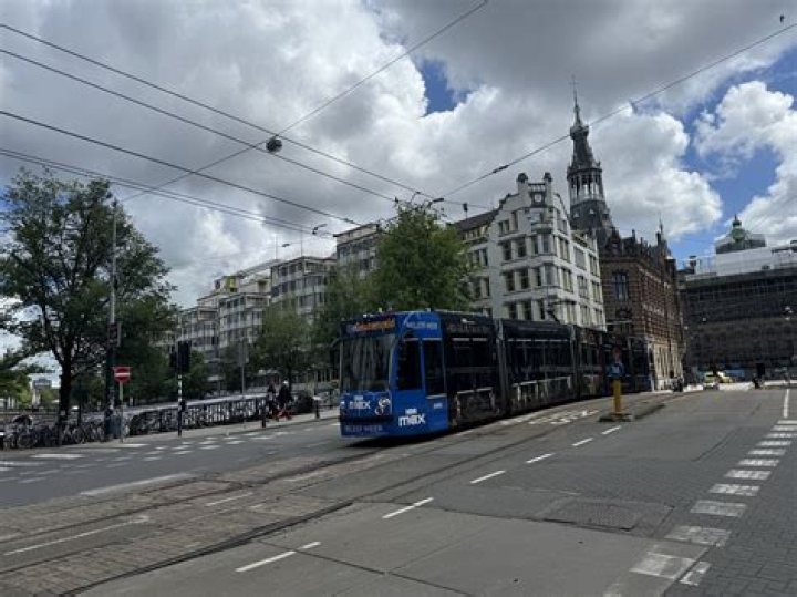 How do I take public transportation in Amsterdam?