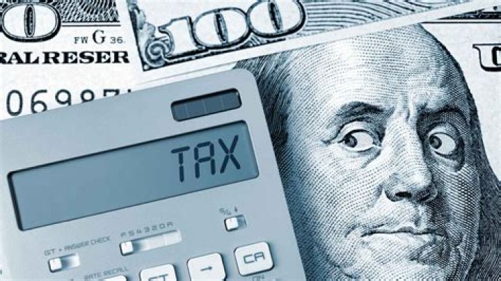 How do LLC owners pay taxes?