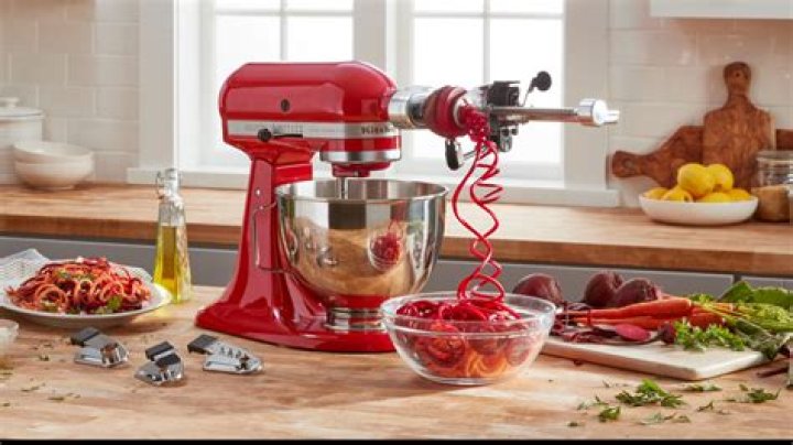 How do you attach a beater to a KitchenAid mixer?