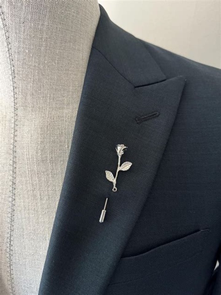 How do you attach a flower lapel pin?