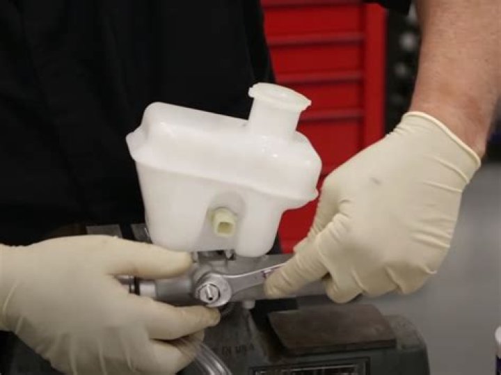 How do you bleed a clutch master cylinder on a motorcycle?