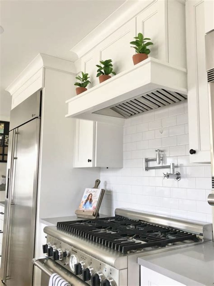 How do you clean a cooking hood?