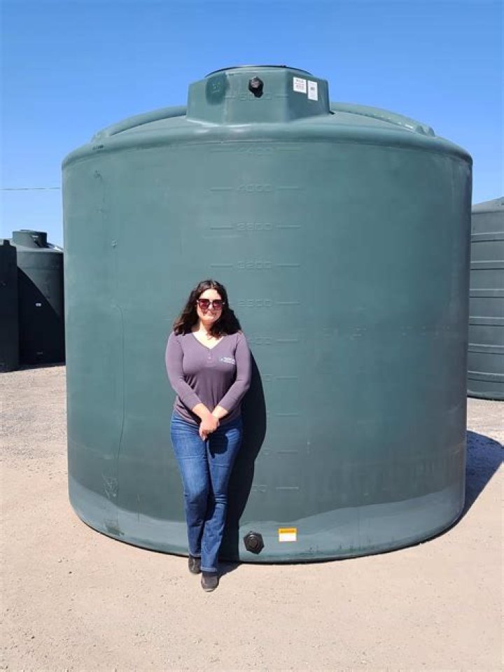 How do you clean a plastic water storage tank?