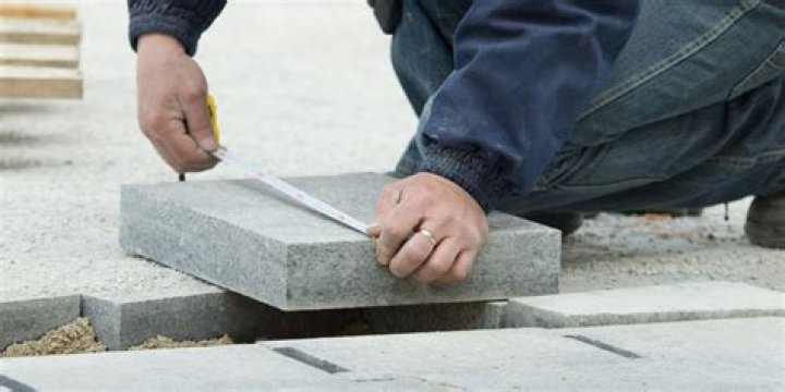 How do you cut concrete bricks?