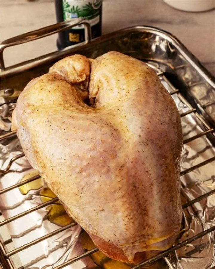 How do you debone a turkey breast before cooking?