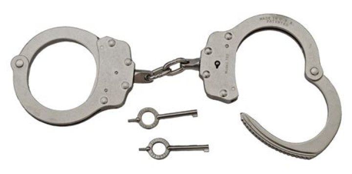 How do you double lock Peerless handcuffs?