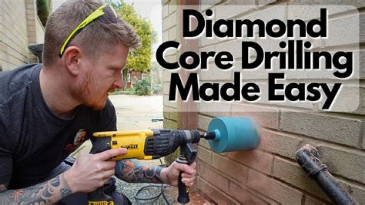 How do you drill into wall tiles?