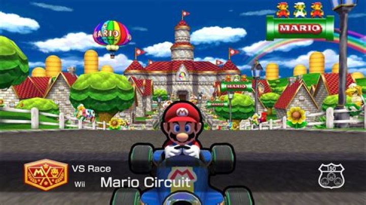 How do you get an expert staff ghost on Mario Kart Wii?