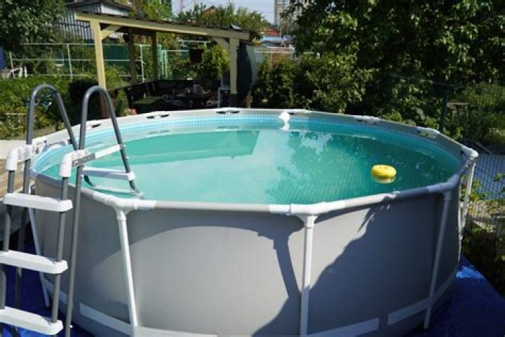 How do you get de off bottom of pool?