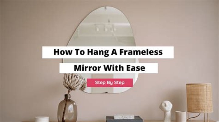 How do you hang a frameless bathroom mirror?