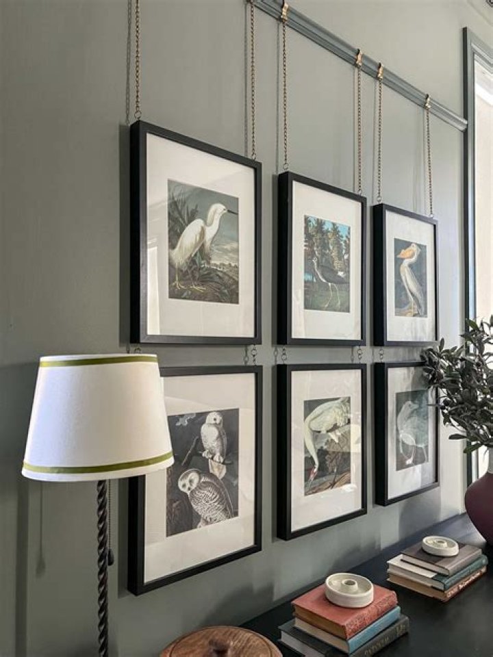 How do you hang canvas art without nails?