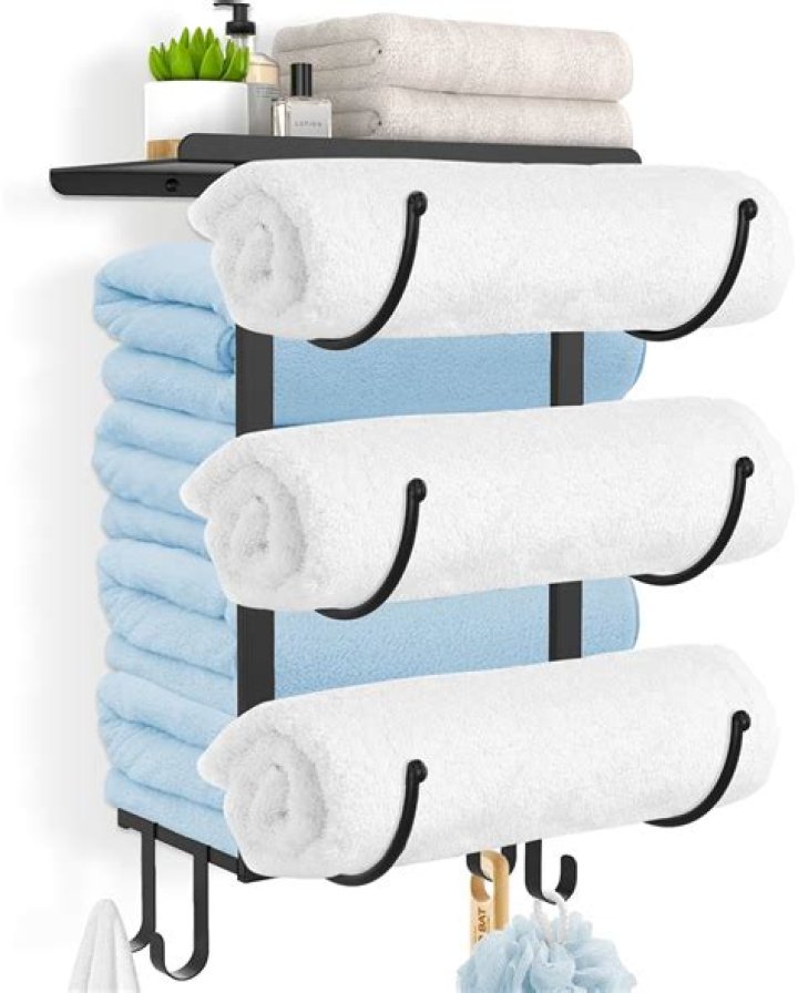 How do you hang towels in a small bathroom?