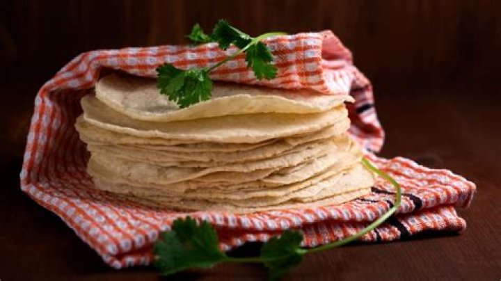 How do you heat corn tortillas on the stove?