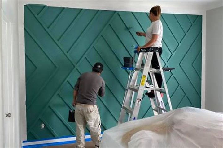 How do you paint a spot on a wall?