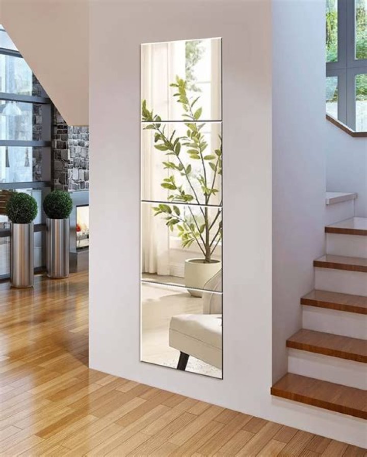 How do you paste a mirror onto plywood?