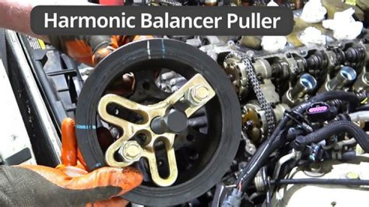 How do you remove a GM harmonic balancer?