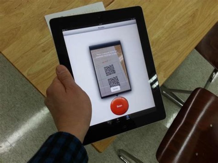 How do you scan a QR code on a tablet?