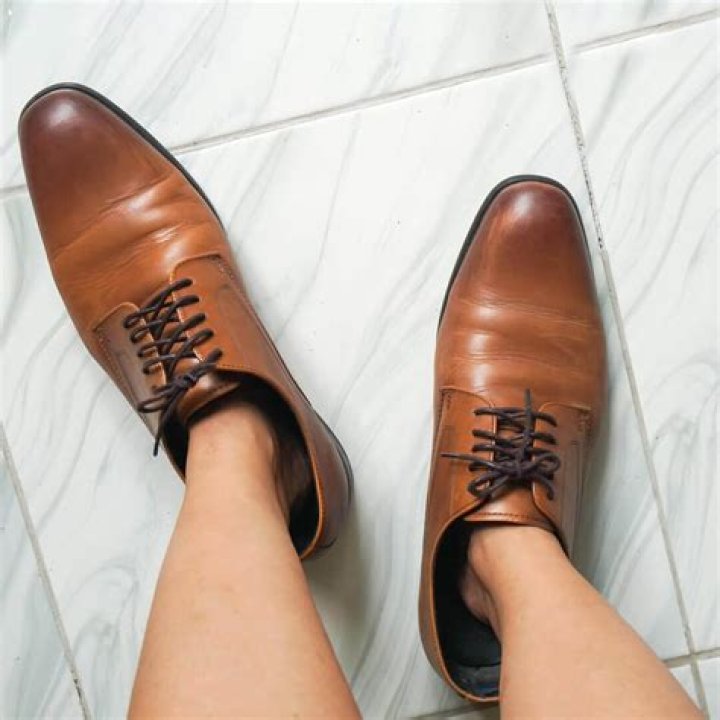 How do you shrink shoes that are too wide?