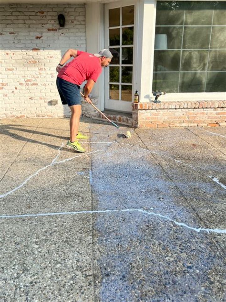 How do you smooth a rough concrete patio?