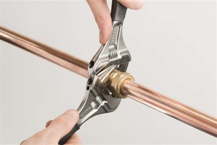 How do you tighten a lock nut?