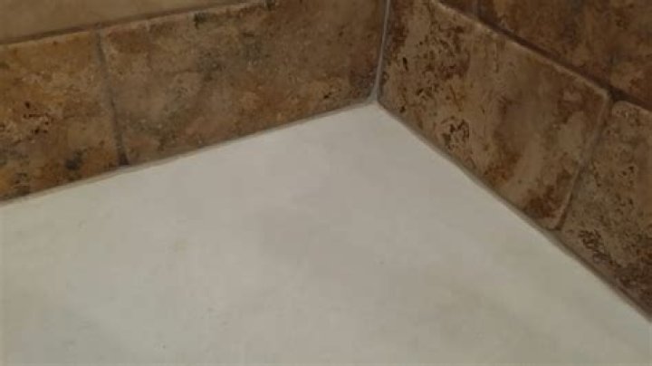 What do you use to clean travertine tile?