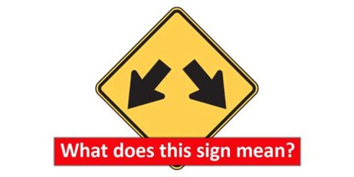 What does the sign with 2 arrows pointing down mean?