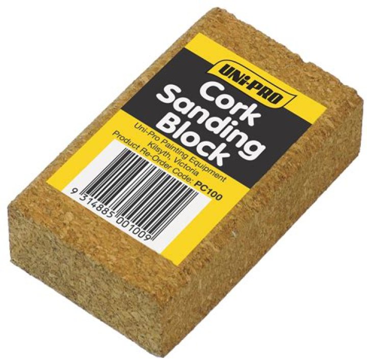 What is a cork sanding block used for?