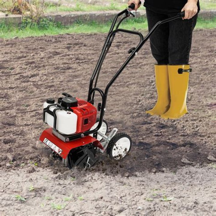 What is a garden tiller used for?