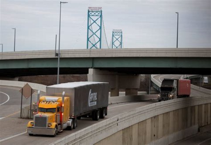 What is an overcall bid in bridge?