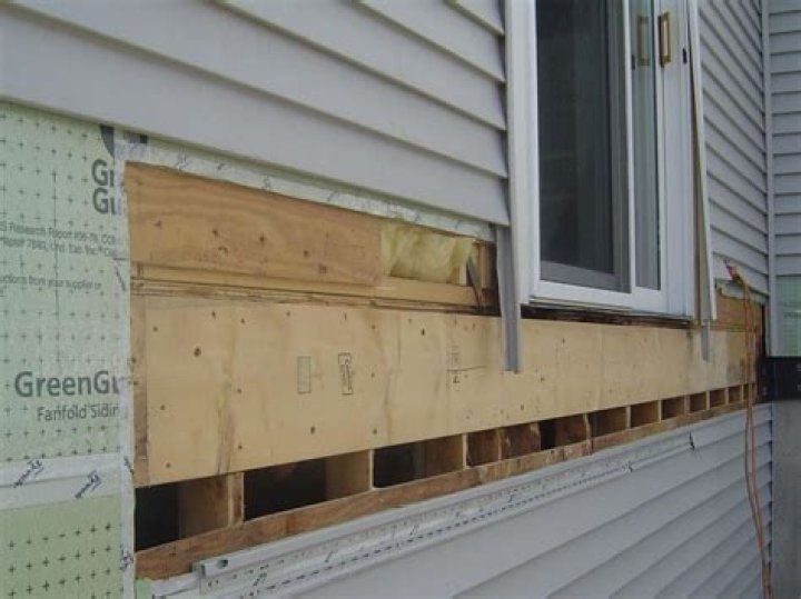 What is behind siding on a house?