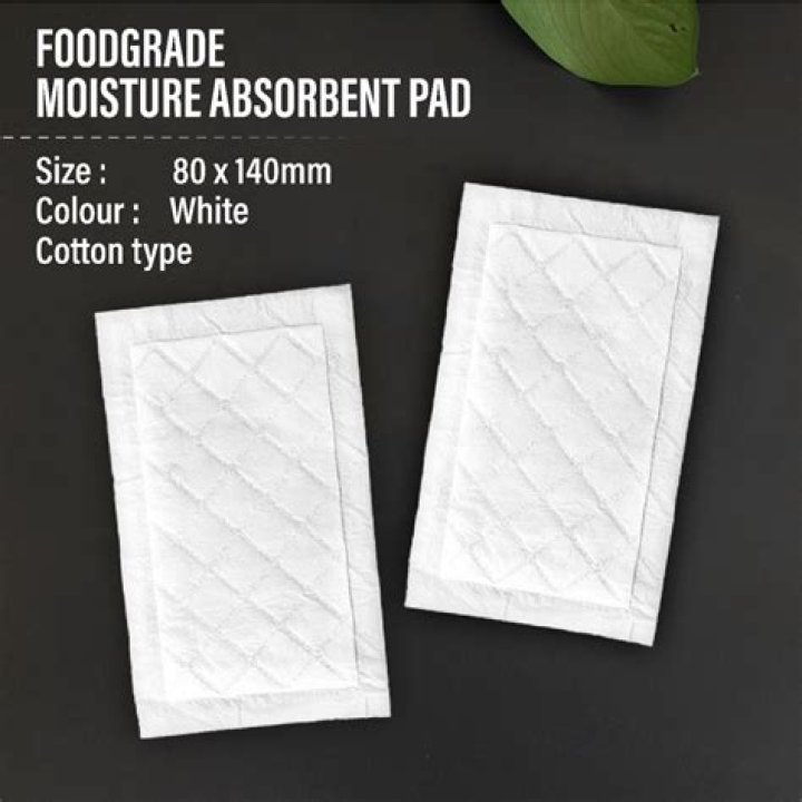 What is the absorbent pad in meat made of?