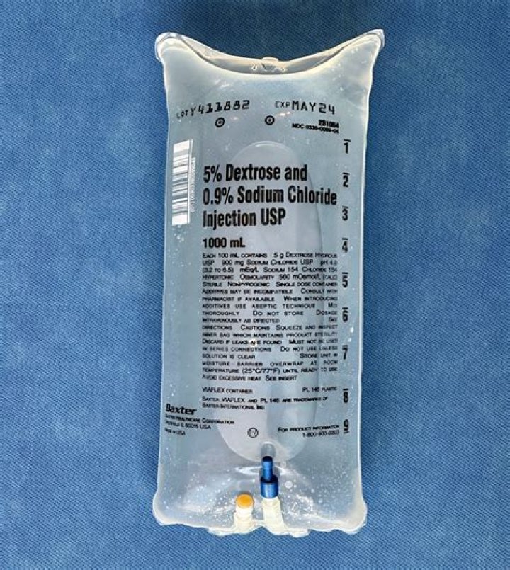What is the amount of saline required to prime the dialyzer?