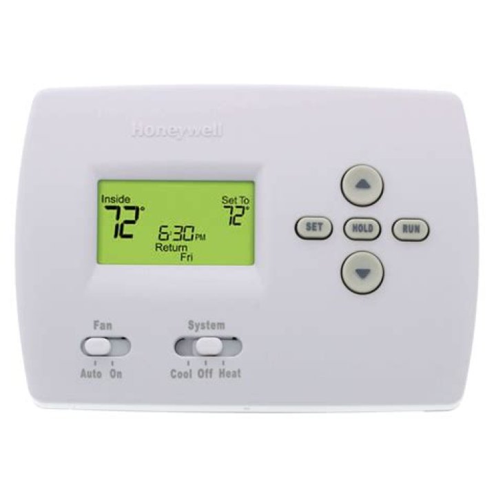 What is the hold button on Honeywell thermostat?
