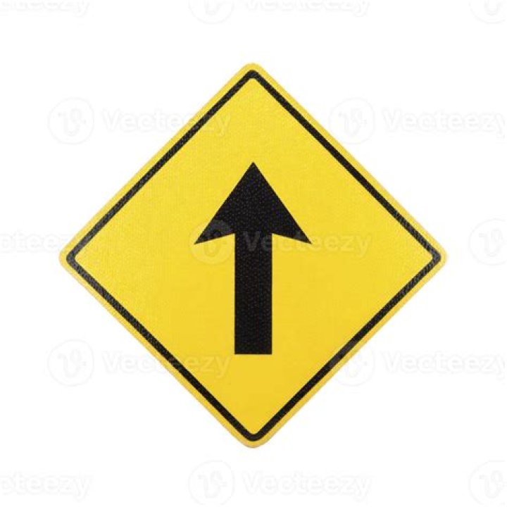 What is the purpose of a diamond shaped sign with black markings?