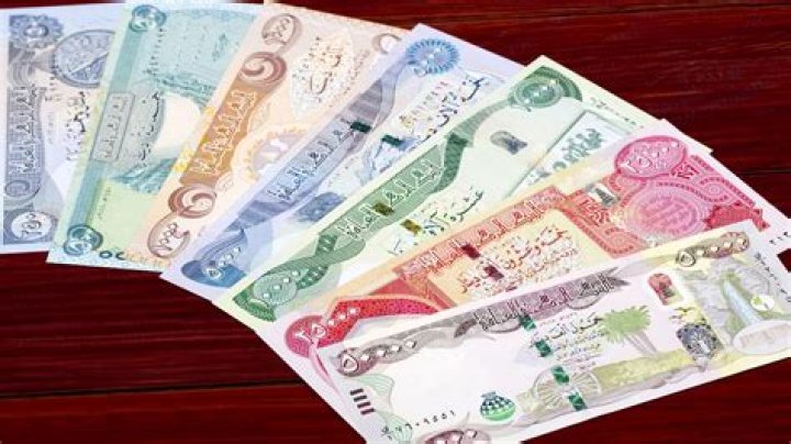 When was the Iraqi dinar devalued?